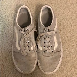 Gray and White Low Top Vans.